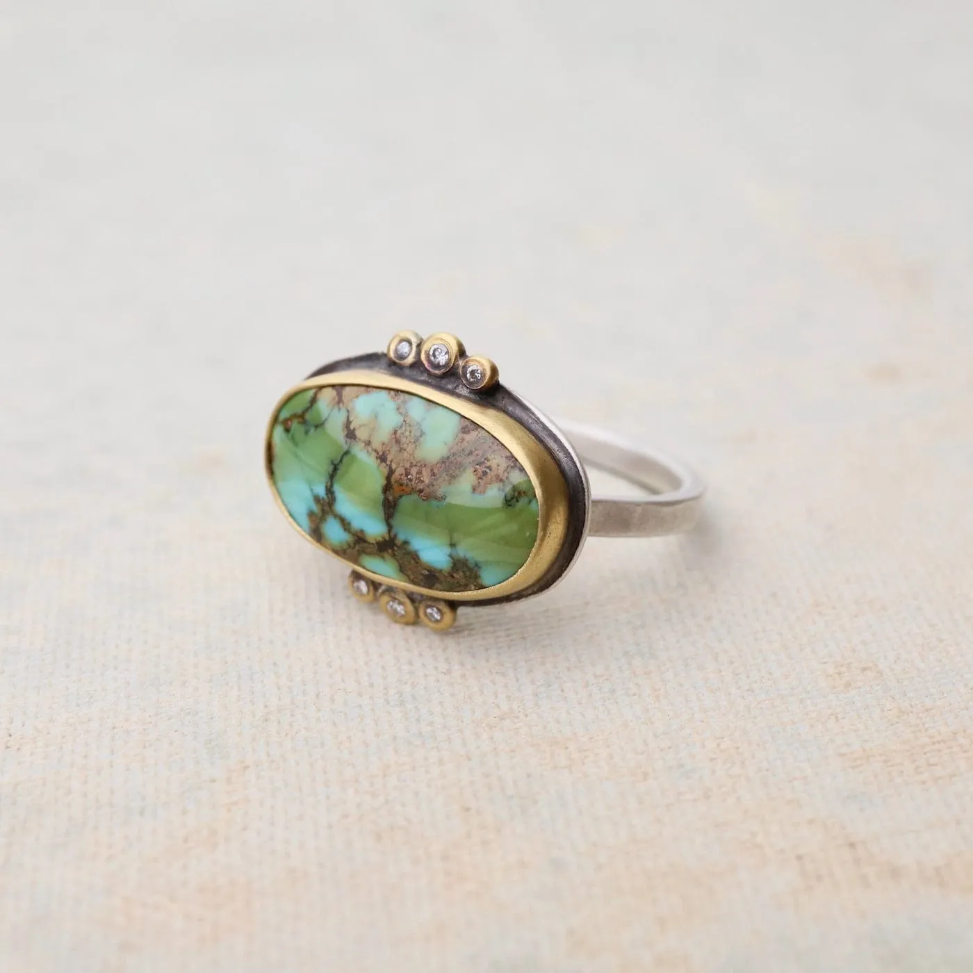 Bezel Set Horizontal Oval Turquoise with Diamond Trios Ring